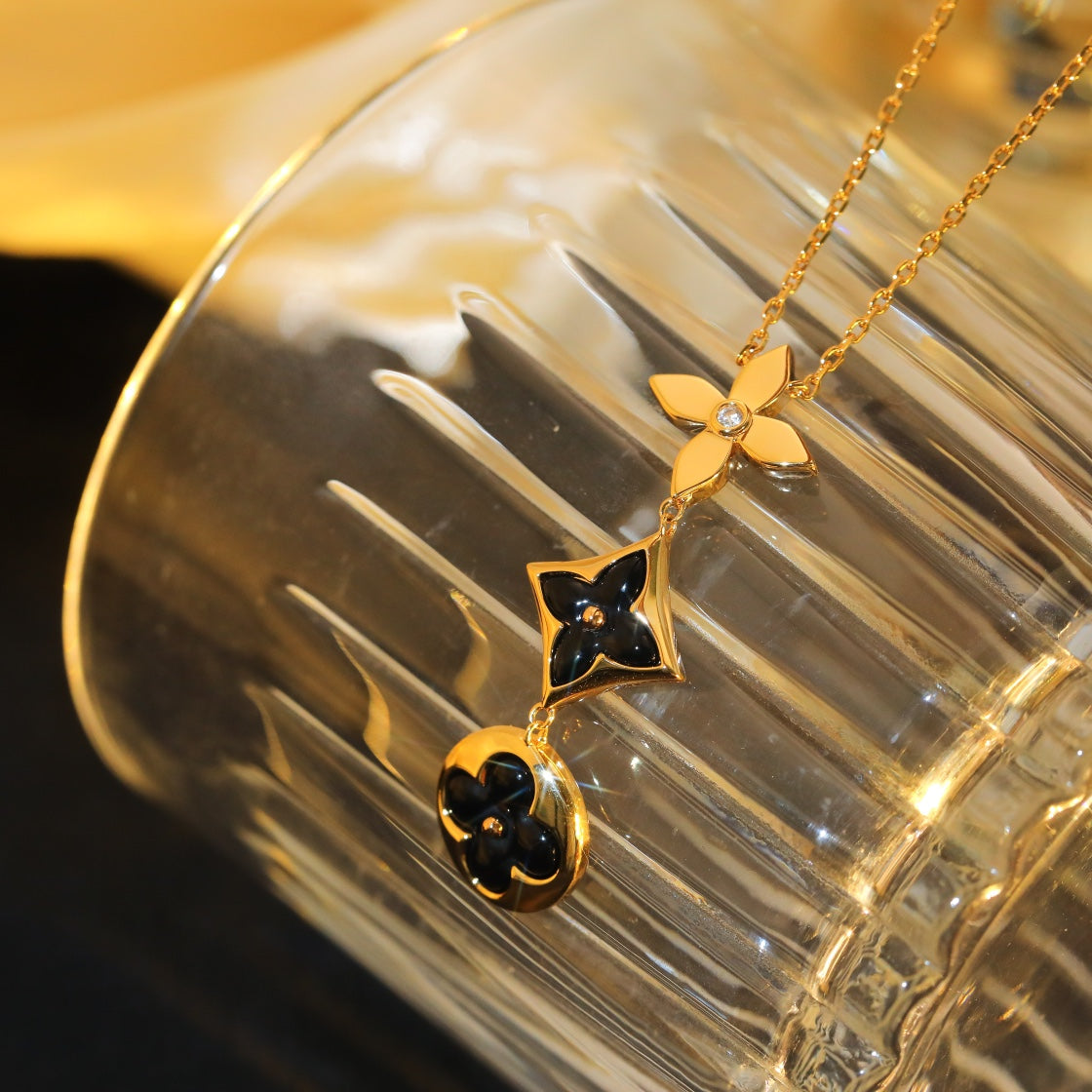 Loco STAR AND SUN ONYX PINK GOLD NECKLACE