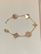 Loco STAR AND SUN 5 MOTIF MOP PINK GOLD BRACELET