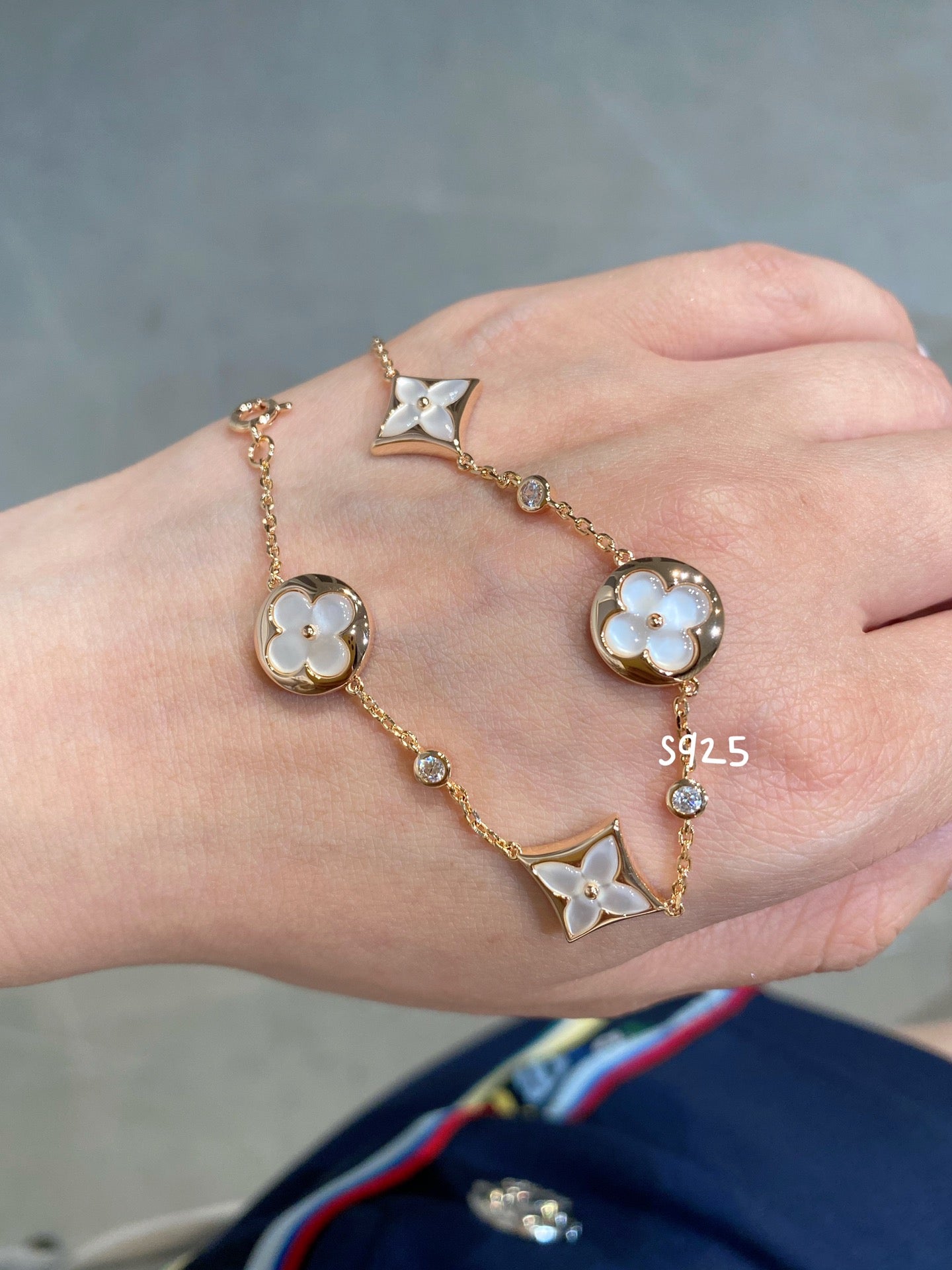 Loco STAR AND SUN 4 MOTIF WHITE MOP PINK GOLD BRACELET