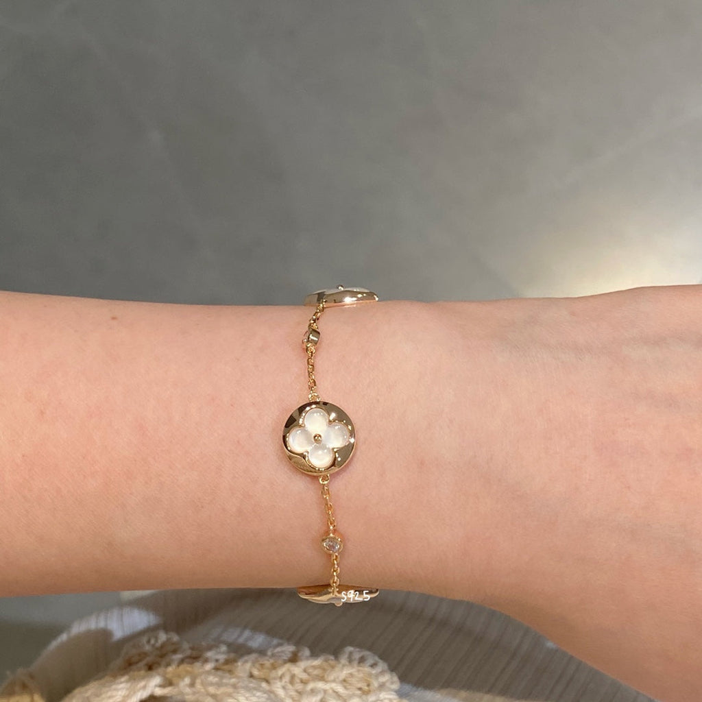Loco STAR AND SUN 4 MOTIF WHITE MOP PINK GOLD BRACELET