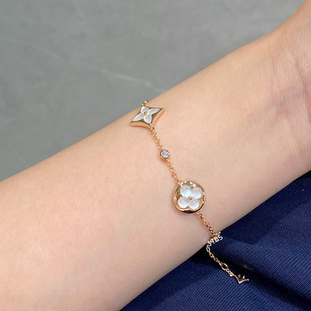 Loco STAR AND SUN 4 MOTIF WHITE MOP PINK GOLD BRACELET
