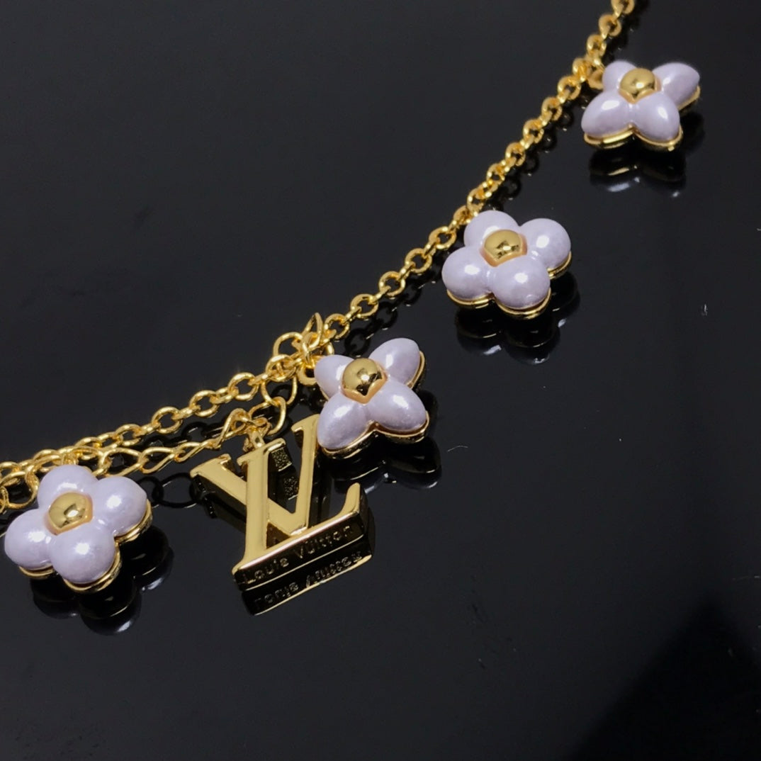 Loco LOGO 6 MOTIF STAR AND SUN GOLD BRACELET