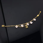 Loco LOGO 6 MOTIF STAR AND SUN GOLD BRACELET