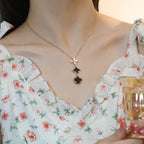 Loco STAR AND SUN ONYX PINK GOLD NECKLACE