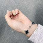 Loco CLOVER 5 MOTIF VEINED ONYX BRACELET SILVER